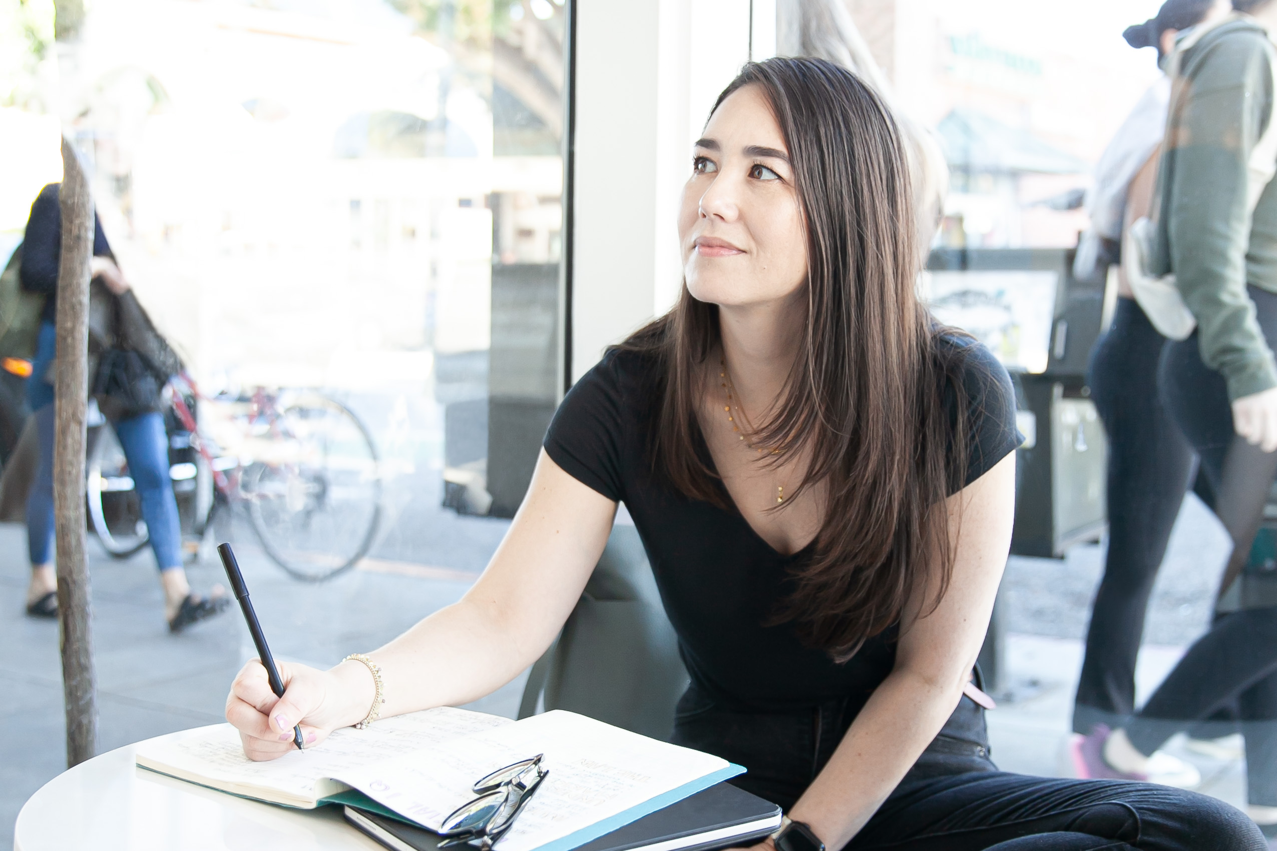 Sondra working at a café